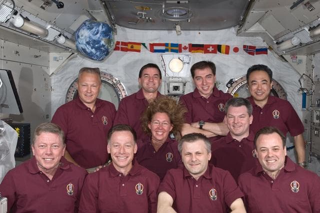 NASA image: STS-135 and Expedition 28 Crewmembers during In-Flight Portrait Session in Kibo