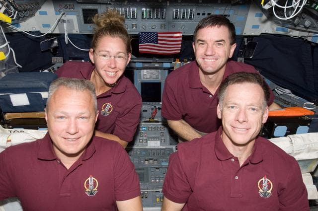 NASA image: In-Flight Portrait of the STS-135 Crew on the Atlantis Flight Deck