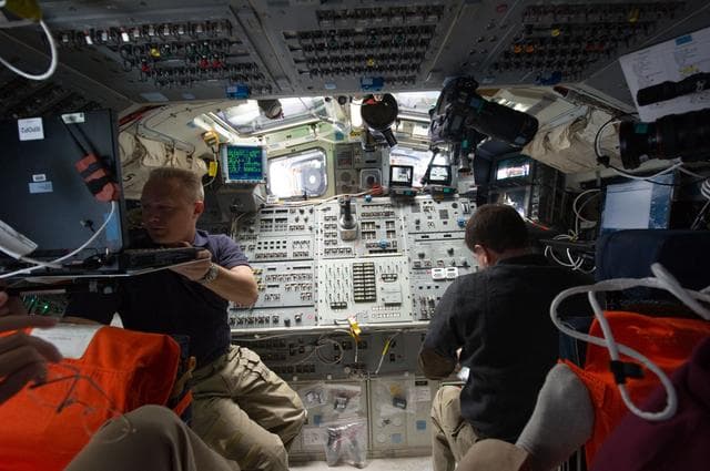 NASA image: Hurley and Walheim on Aft Flight Deck during Undocking OPS