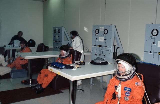 NASA image: STS-28 crewmembers don LESs prior to Columbia, OV-102, launch