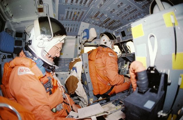 NASA image: STS-29 Discovery, OV-103, crew on flight deck prepares for reentry