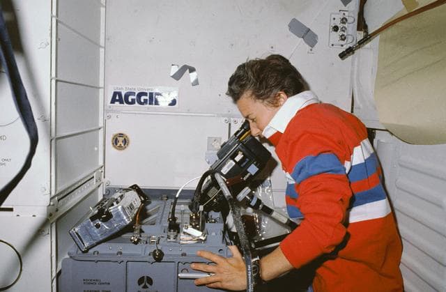NASA image: STS-30 MS Cleave uses camcorder to record FEA-2 crystal growth