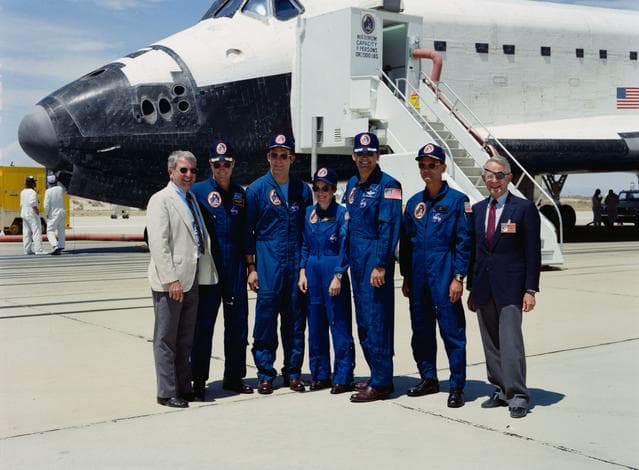 NASA image: STS-30 crew poses with NASA administrators in front of OV-104 on EAFB runway