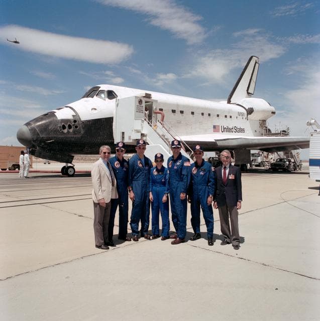 NASA image: STS-30 crew poses with NASA administrators in front of OV-104 on EAFB runway
