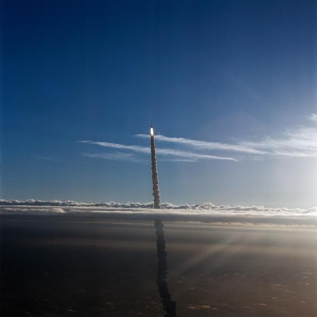 Air-to-air view of STS-32 Columbia, OV-102, launch
