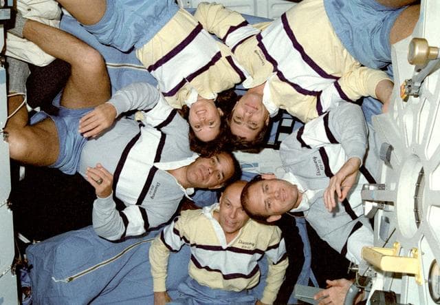 NASA image: STS-33 crewmember pose on Discovery, OV-103, middeck for onboard portrait
