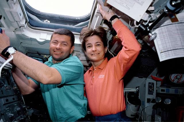 NASA image: STS-37 Pilot Cameron and MS Godwin work on OV-104's aft flight deck