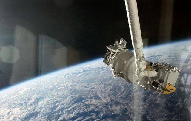 NASA image: STS-39 SPAS-II IBSS is grappled by remote manipulator system (RMS)