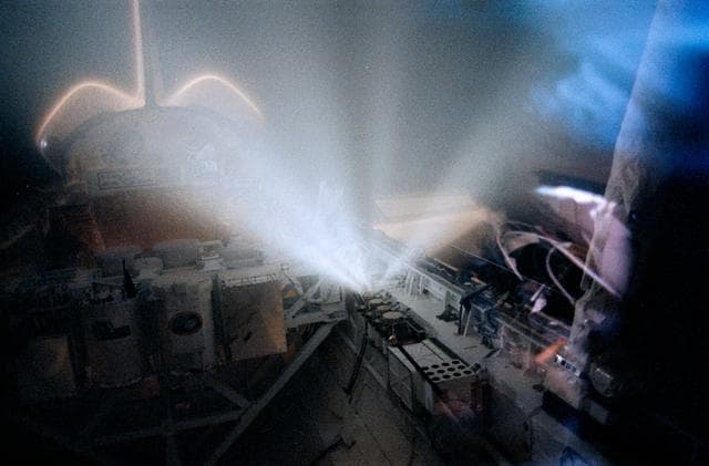 NASA image: STS-39 Critical Ionization Velocity (CIV) gas release from OV-103 payload bay