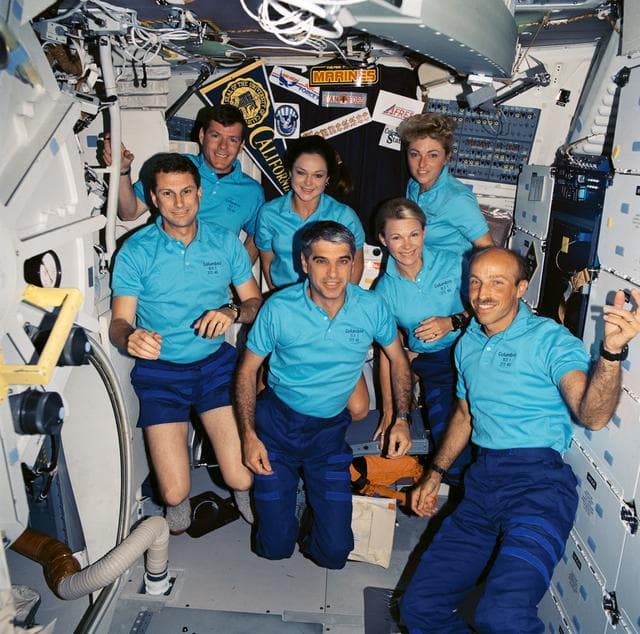 NASA image: STS-40 crewmembers pose for onboard (in space) portrait on OV-102's middeck