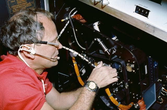 NASA image: STS-42 MS/PLC Norman E. Thagard adjusts Rack 10 FES equipment in IML-1 module
