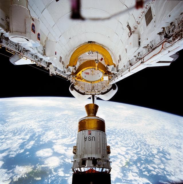 NASA image: STS-43 TDRS-E / IUS is deployed from OV-104's payload bay (PLB)