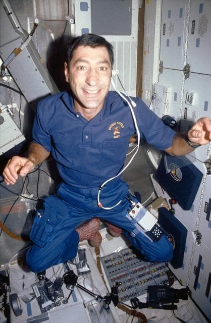 NASA image: STS-44 Mission Specialist (MS) Runco floats on OV-104's middeck