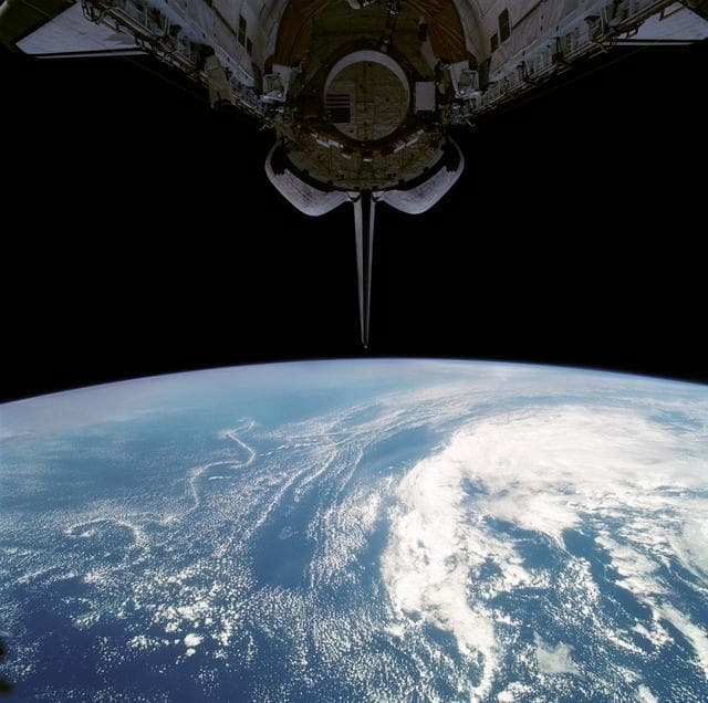 NASA image: Volcanic Plume from Mt. Unzen, Dust Cloud, cloud Vortices