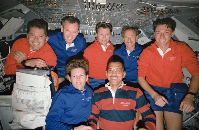 NASA image: STS-45 crew poses for onboard (in-space) portrait on OV-104's flight deck