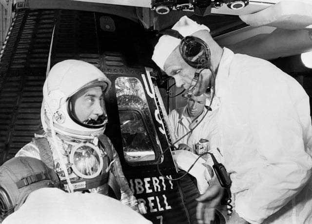 NASA image: Astronaut Grissom talks to backup John Glenn prior to insertion