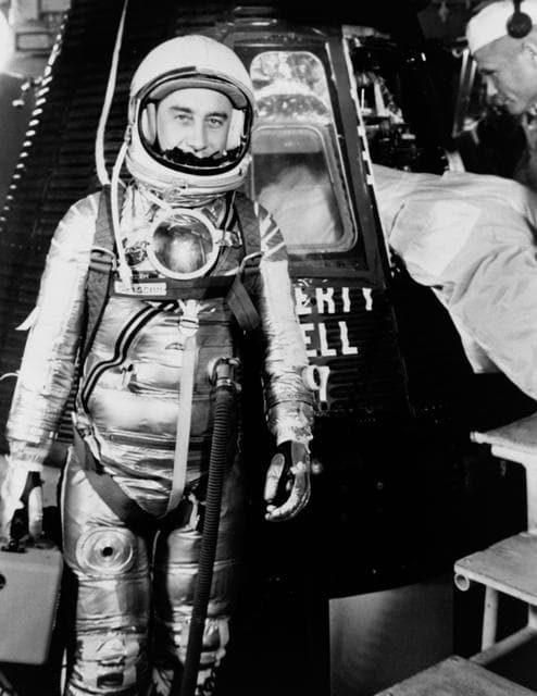 NASA image: Astronaut Grissom on level 3 in front of Liberty Bell 7 capsule