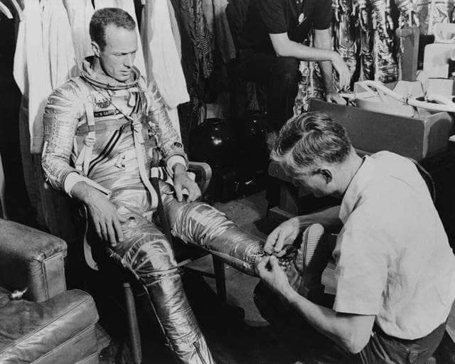 NASA image: Astronaut Scott Carpenter and technician Joe Schmitt during suiting exercise