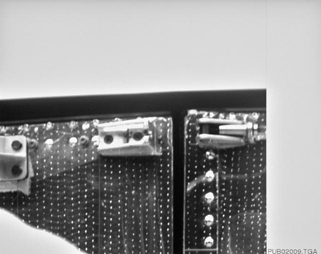 NASA image: Latch of HST aft shroud photographed by Electronic Still Camera