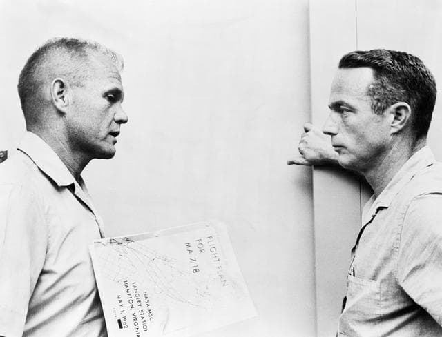 NASA image: John Glenn and Scott Carpenter discuss flight plan for MA-7 