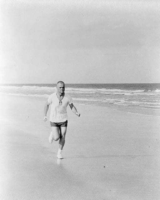 NASA image: TRAINING - ASTRONAUT JOHN H. GLENN, JR. - FRIENDSHIP "7" EXERCISE (RUNNING ON BEACH) - FL