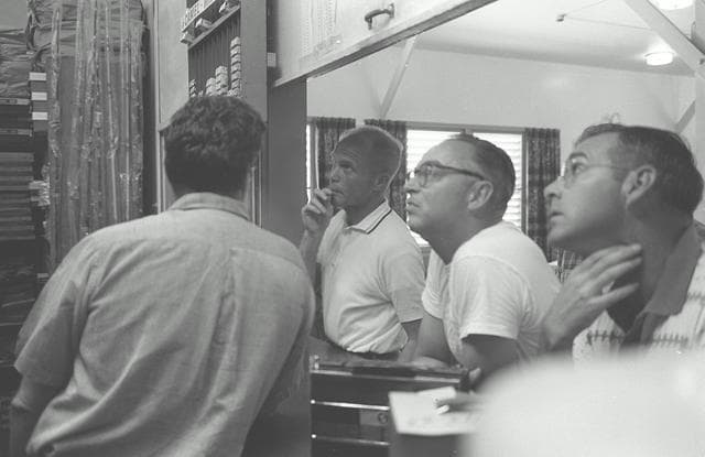 NASA image: Astronauts Carpenter and Glenn relax following breakfast during MA-6 activity
