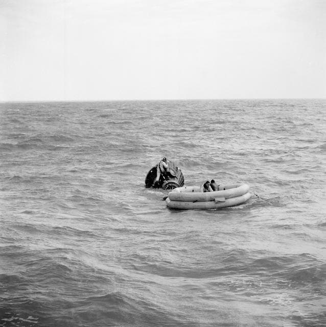 NASA image: Gemini 3 prime crew egress throught command pilot's hatch during training