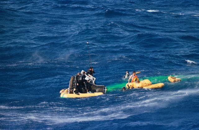 NASA image: GEMINI-TITAN (GT)-3 - RECOVERY OPERATIONS - ASTRONAUT JOHN W. YOUNG (SPACECRAFT IN WATER) - ATLANTIC