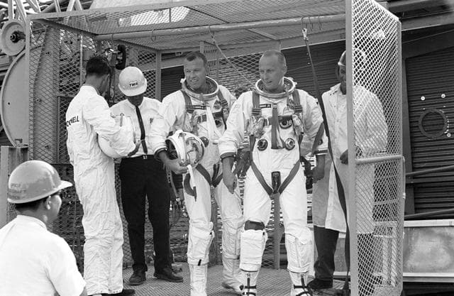 NASA image: BEING HOISTED TO WHITE ROOM - CAPE