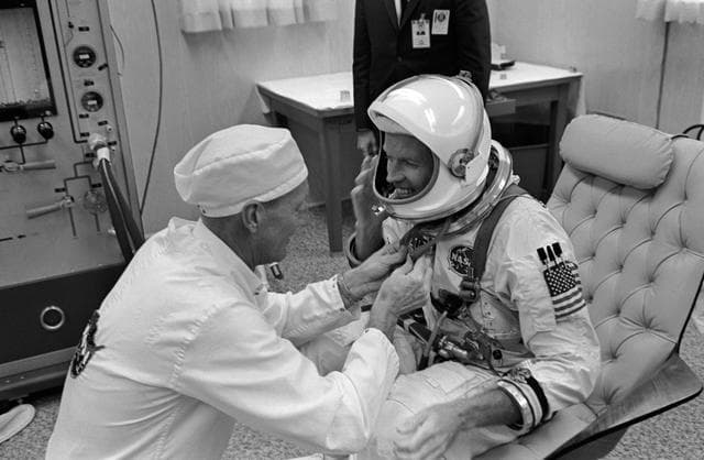 NASA image: GT-5 Command Pilot Suiting Up