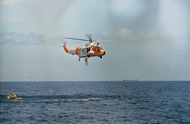 NASA image: WATER EGRESS (GT-7)(COMMAND PILOT BEING HOISTED) - TRAINING