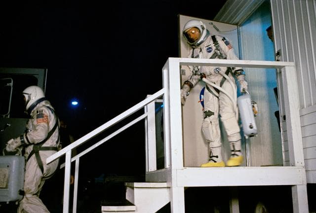 NASA image: GT-6 PREFLIGHT ACTIVITY (LEAVE SUITING TRAILER) -  ASTRONAUT WALTER M. SCHIRRA, JR. - SUIT