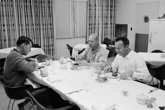 NASA image: ASTRONAUT WALTER M. SCHIRRA, JR. - MISC. - GEMINI-TITAN (GT)-6 (PRIME CREW AT BREAKFAST) - CAPE