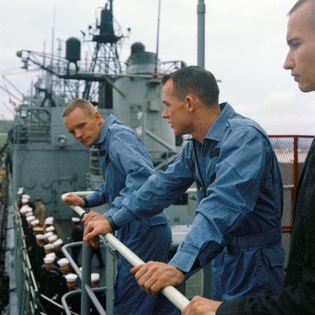 Gemini 8 crew stands on deck of recovery vessel
