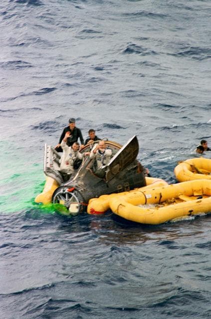 NASA image: ASTRONAUT CERNAN, EUGENE A. - RECOVERY (GT-9A)(S/C IN WATER W/HATCHES OPEN)