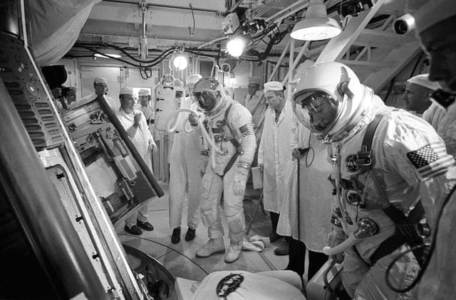 NASA image: Gemini 10 prime crew in White Room preparing for insertion