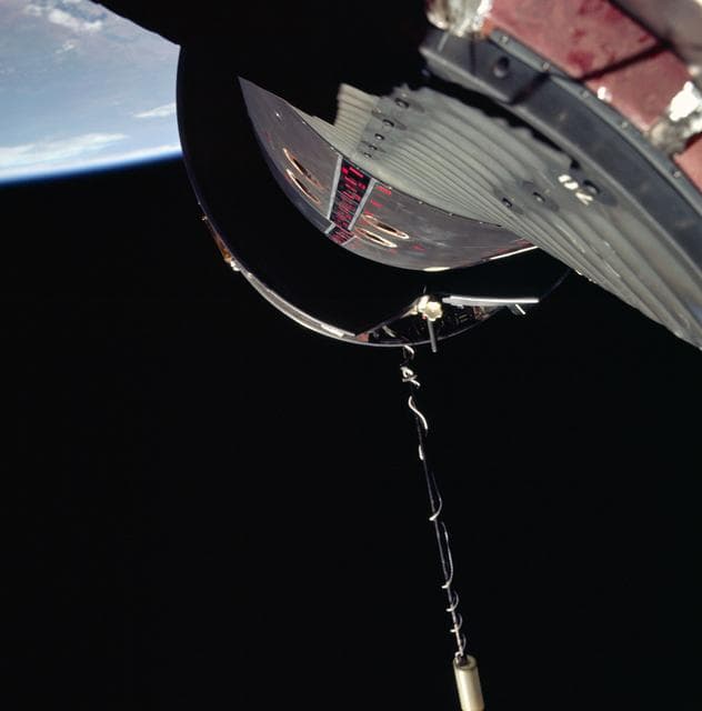 NASA image: Nose of Gemini 11 spacecraft and Agena Target Vehicle as seen during EVA