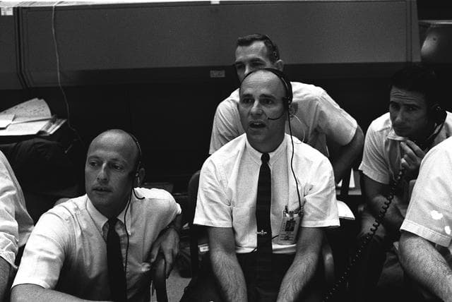 NASA image: KEY CONTROL PEOPLE IN MMC DURING LUNAR TOUCHDOWN  7/20/69