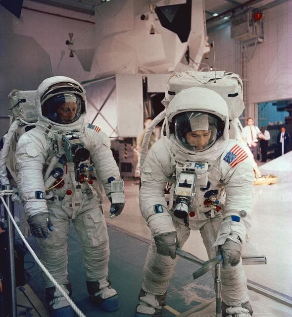 NASA image: Apollo 12 crewmembers participate in lunar surface extravehicular simulations
