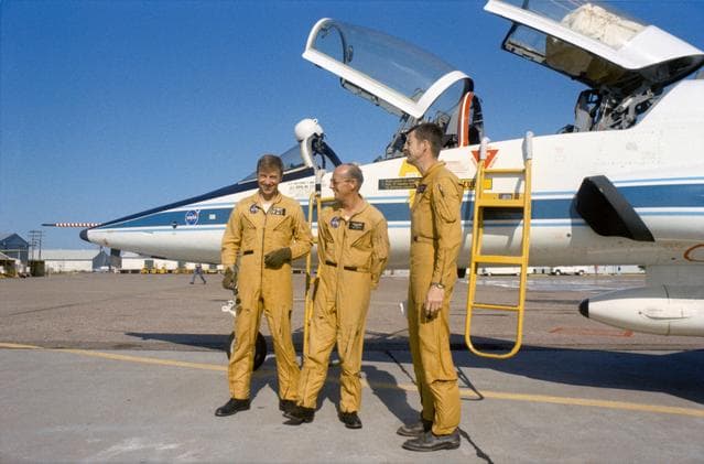 NASA image: Prime crew of the Skylab 2 mission stand beside T-38 prior to take off