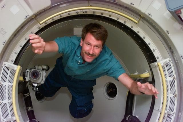 Pilot Kent Rominger floats in tunnel