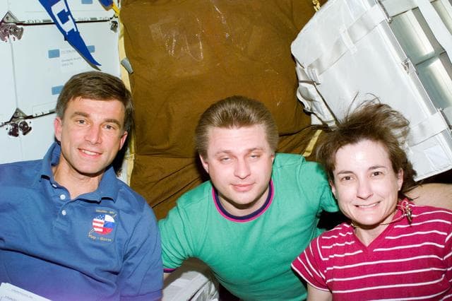NASA image: Crewmember activity in shuttle middeck and Mir Space Station