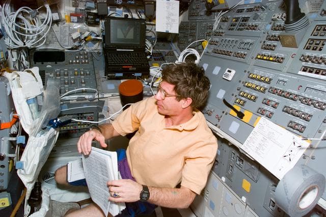 NASA image: STS-81 crewmembers on the orbiter's flight deck