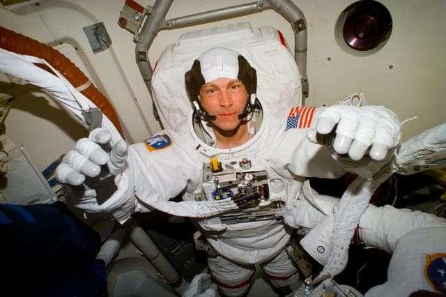 NASA image: Mission Specialists in Airlock
