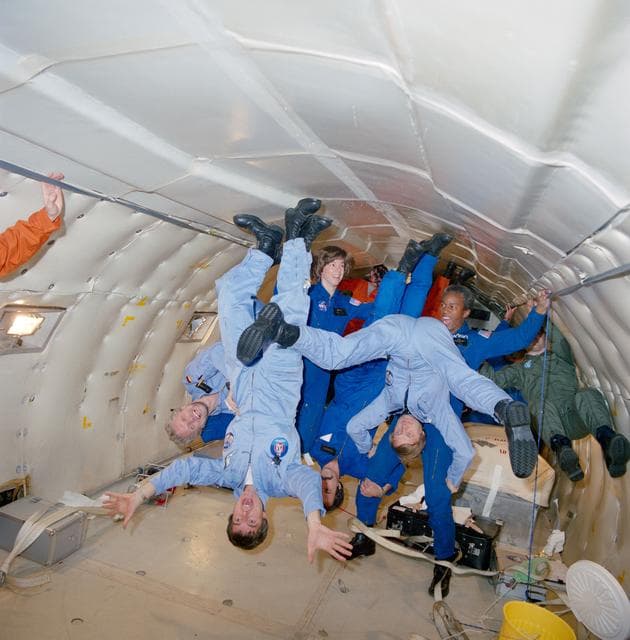 NASA image: STS 61-A crewmembers training on the KC-135