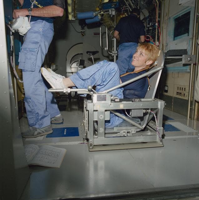 NASA image: Payload specialists Millie Hughes-Fulford in Body Mass Measurement Device