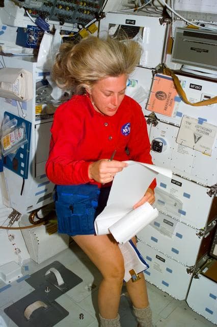 NASA image: MS Davis checks the daily mail