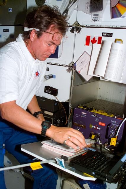 NASA image: MIM - PS Tryggvason checks the procedures for the middeck experiment