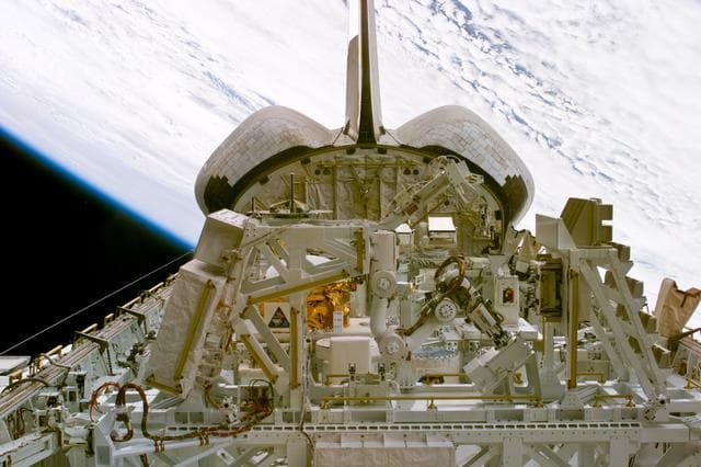 NASA image: MFD - Robot arm during experiment OPS
