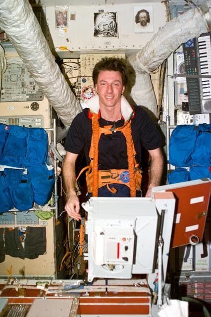 NASA image: Foale exercises on treadmill in Base Block